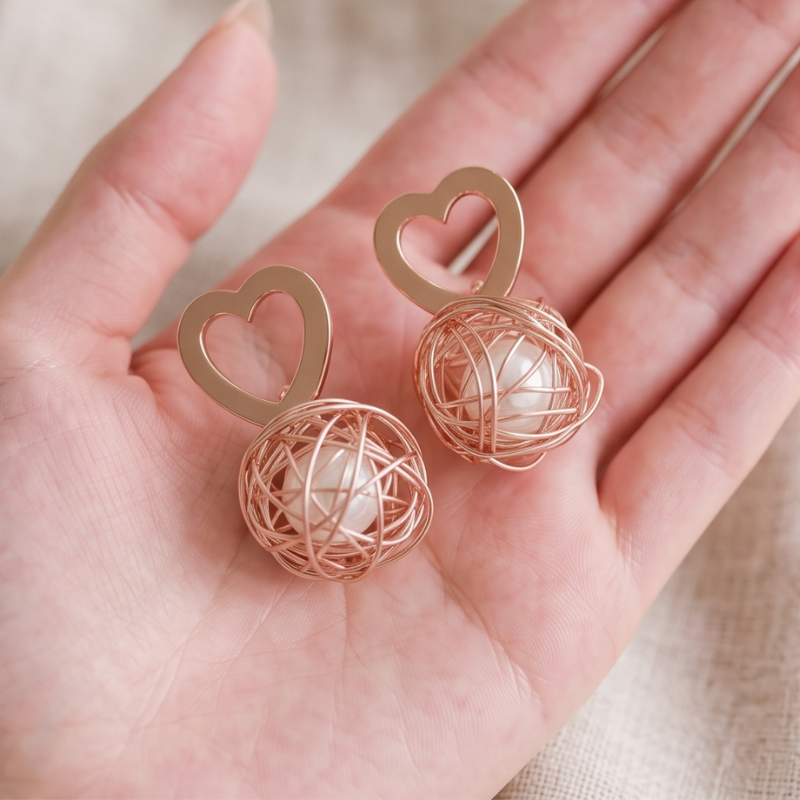 Rosé Orbit Coiled Pearl Earrings
